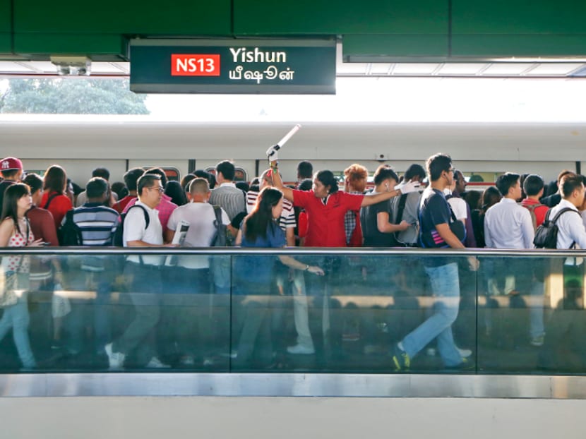 A huge crowd built up at the platform of Yishun MRT Station at 8am due to train delays caused by a track fault on July 3 2015. Photo: Ooi Boon Keong