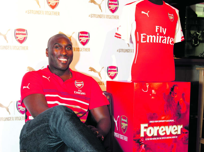 Sol Campbell with the Arsenal home jersey. Photo: MERCURY PR