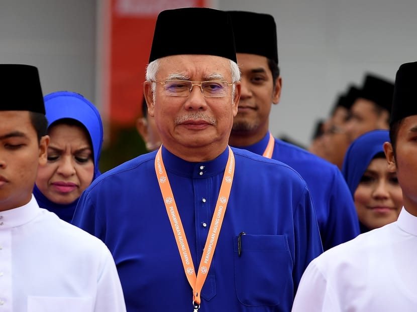 Malaysian Prime Minister Najib Razak arrives to address the annual congress of his ruling party, the United Malays National Organisation in Kuala Lumpur on Dec 1, 2016. Photo: AFP