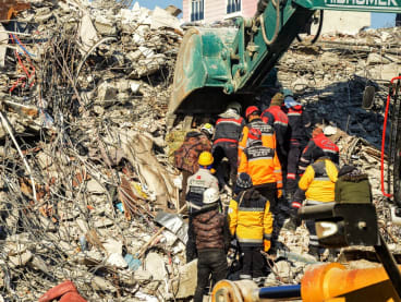 Rescuers carry out search operations among the rubble of collapsed buildings in Adiyaman, Turkey on Feb 9, 2023, three days after a 7.8-magnitude earthquake struck southeast Turkey.