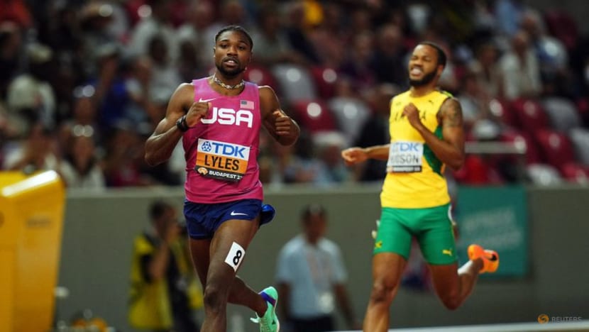 Lyles clocks fastest time in semis after cart crash