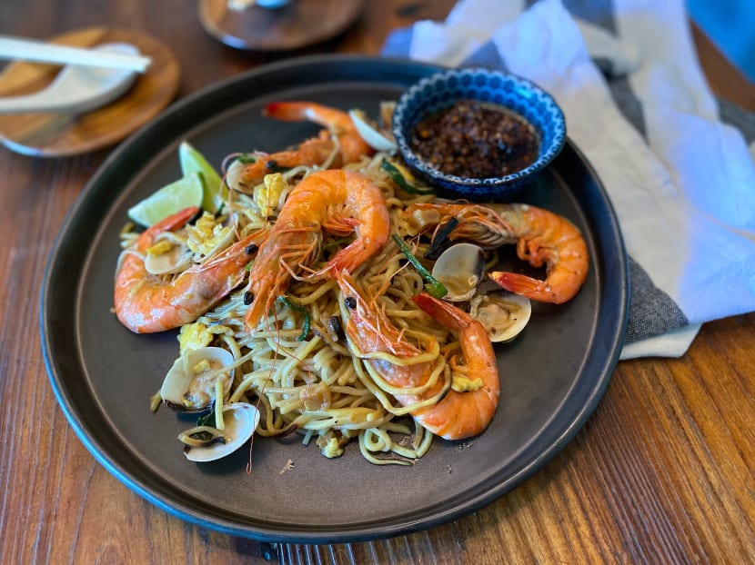 Damn Easy Hokkien Mee (pictured) from Slake restaurant will be delivered to customers in vacuum-sealed packs for them to put together at home.