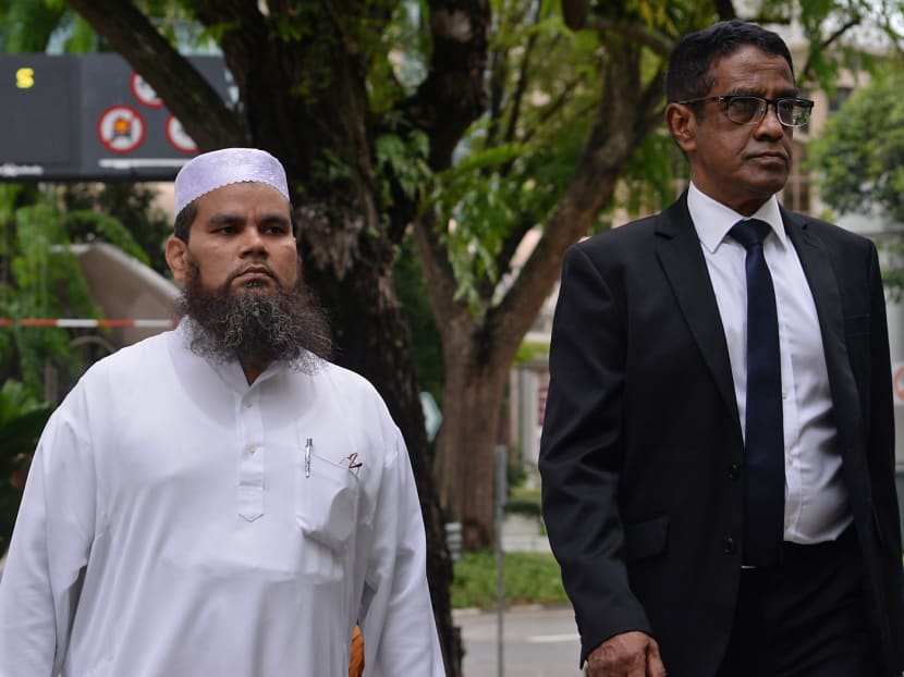 Imam Nalla Mohamed Abdul Jameel Abdul Malik (left) and his lawyer outside the courts on Monday (April 3). Photo: Robin Choo