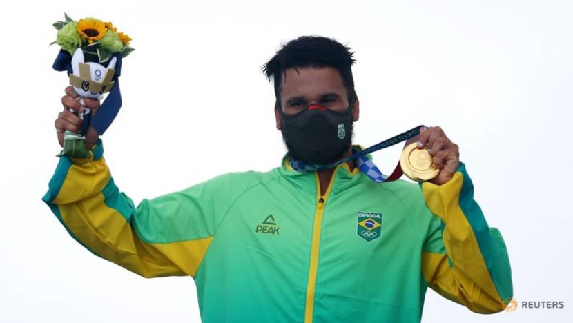 Olympics-Surfing-Ferreira completes long ride from cooler lid to gold Olympics-Surfing-Ferreira completes long ride from cooler lid to gold
