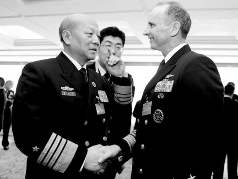 Amid an atmosphere of growing mistrust, intensified contact between Chief of US Naval Operations, Admiral Jonathan Greenert (right) and his Chinese counterpart, Admiral Wu Shengli (left), could serve to alleviate tensions and thereby lay the foundation for enhanced understanding and cooperation. Photo: Reuters