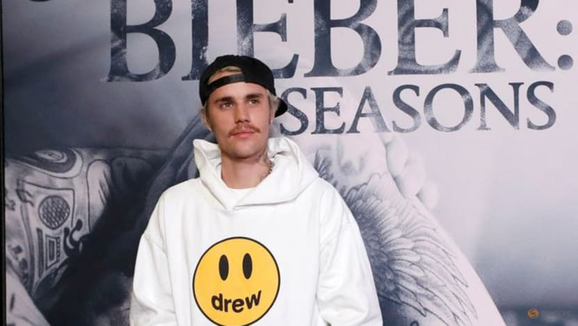 Justin Bieber says he's working to recover from partial face paralysis