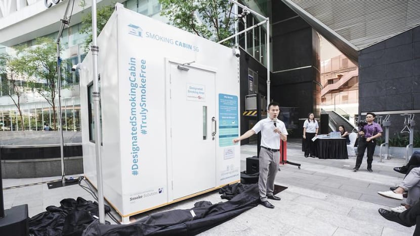 Smoking cabin that turns cigarette smoke into clean air launched in one-north Smoking cabin that turns cigarette smoke into clean air launched in one-north