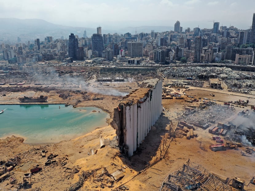 An aerial view shows the massive damage done to Beirut port's grain silos and the area around it on Aug 5, 2020, one day after a mega-blast tore through the harbour in the heart of the Lebanese capital with the force of an earthquake, killing more than 100 people and injuring over 4,000.