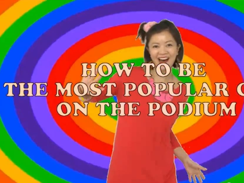 Michelle Chong revealed as infamous Mambo Queen of the podium!