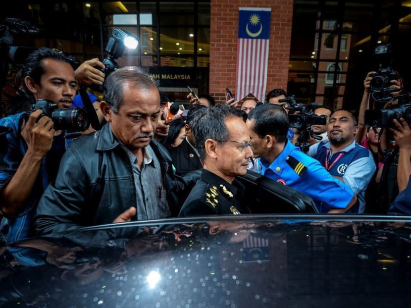 MACC director (Special Operations) Bahri Mohamad Zin getting into his car after briefing media on the questioning by police at his office today (Aug 3). Photo: The Malaysian Insider