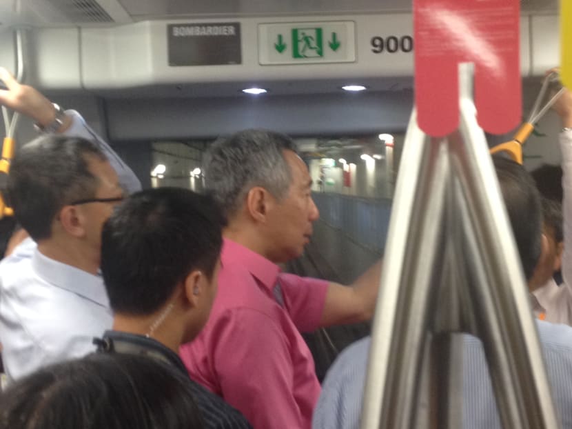 Prime Minister Lee Hsien Loong on board a train on the new Downtown Line Stage 1. Photo: Mysara Bte Mohamad Aljaru