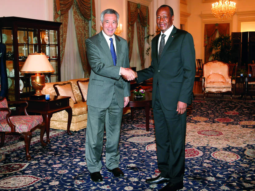 Burkina Faso President Blaise Compaore meeting Prime Minister Lee Hsien Loong on Wednesday at the Istana during a private visit in Singapore. Photo: AP