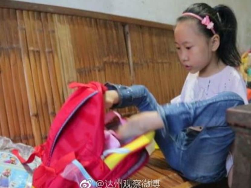 Chinese schoolgirl caught using robot to write her homework- now
