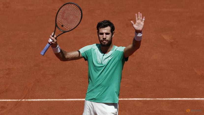 Khachanov digs deep to reach French Open last eight