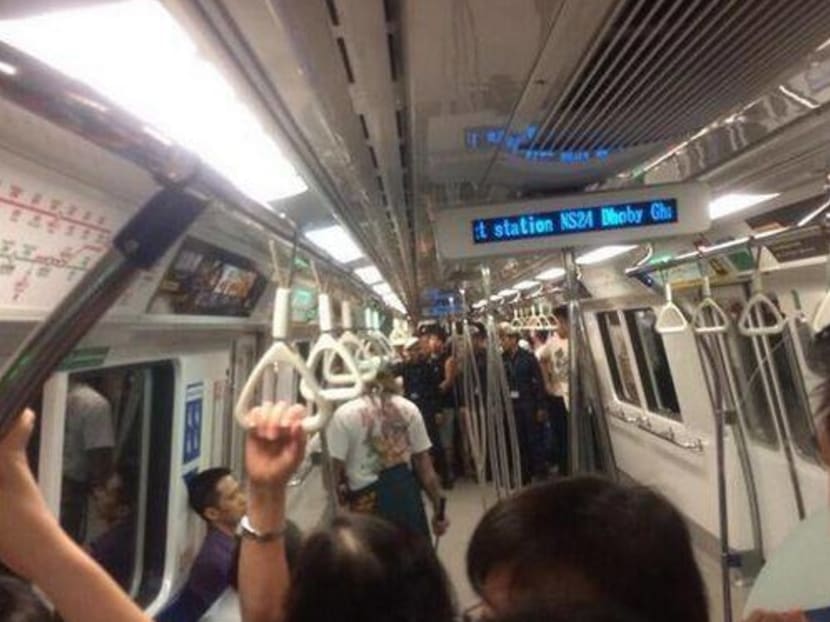The 'samurai' as seen on the MRT at Dhoby Ghaut station today. Photo: Twitter user @swirlsof