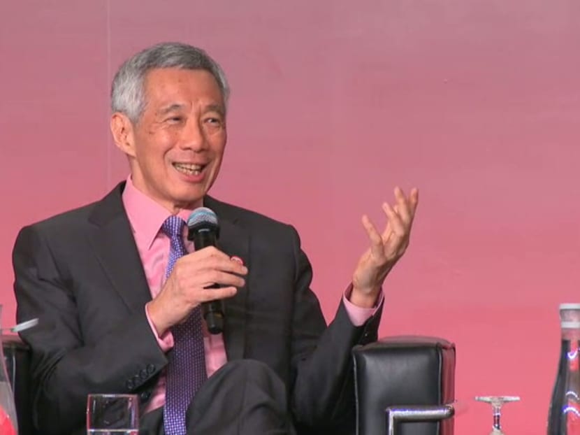 Prime Minister Lee Hsien Loong taking questions from the audience after his speech at the Smart Nation Summit on Wednesday, June 26, 2019.