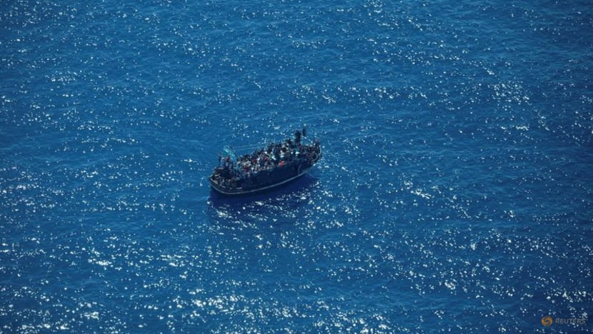 Italy's coastguard works to rescue 1,200 migrants drifting at sea Italy's coastguard works to rescue 1,200 migrants drifting at sea