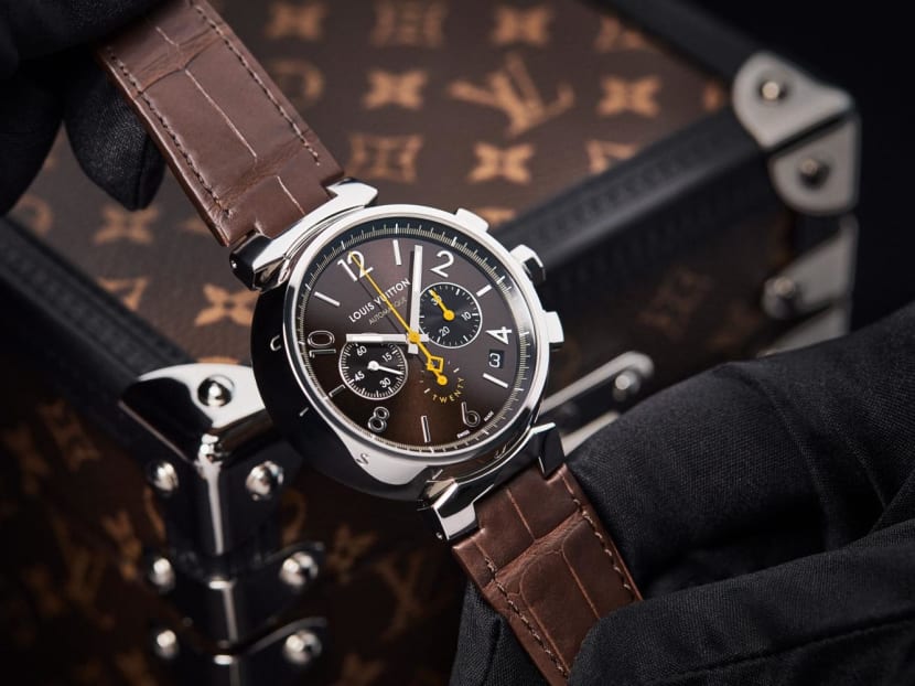 This limited edition Louis Vuitton Tambour watch comes in a special monogram trunk