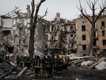 Firefighters work among debris of a destroyed building by a rocket strike in Kramatorsk on Feb 2, 2023, amid the Russian invasion of Ukraine.