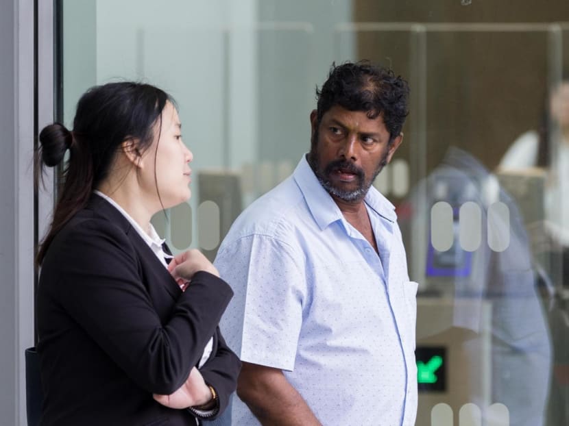 Jayaraman Sankaran (right) at the State Courts on March 21, 2023. Jayaraman Sankaran (right) at the State Courts on March 21, 2023.
