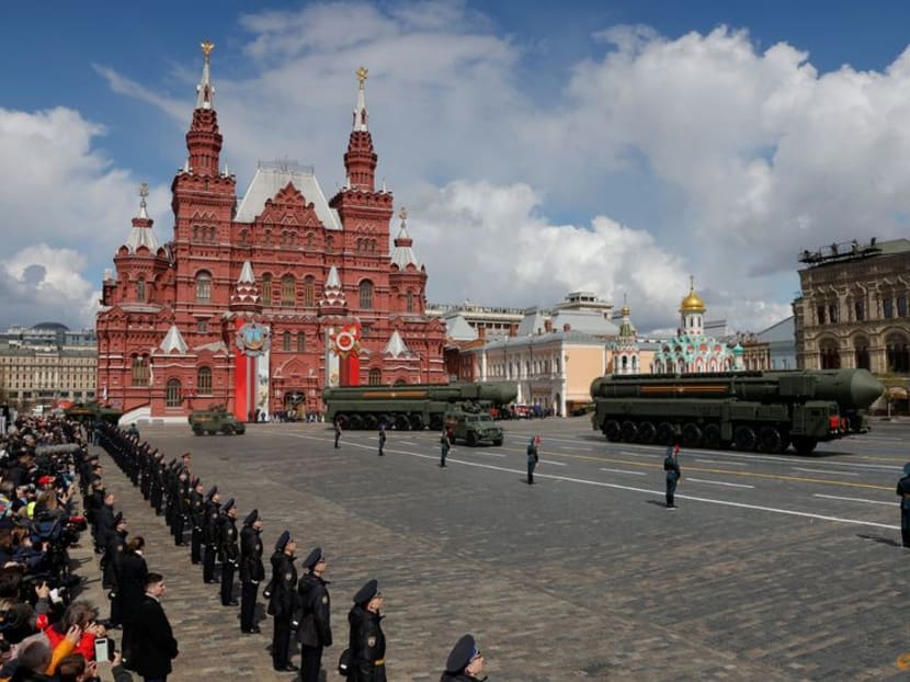Russian Tigr-M (Tiger) all-terrain infantry mobility vehicles and Yars intercontinental ballistic missile systems drive in Red Square during a military parade on Victory day in central Moscow, Russia May 9, 2022. 