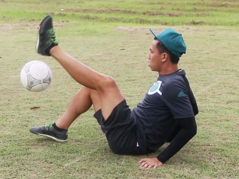 Professional football "freestyling" is gaining popularity in Singapore. Photo: Raj Nadarajan/TODAY