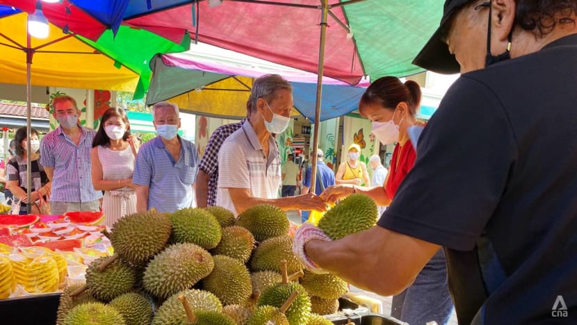 Greater durian crop sees sellers lowering prices, giving them away for free