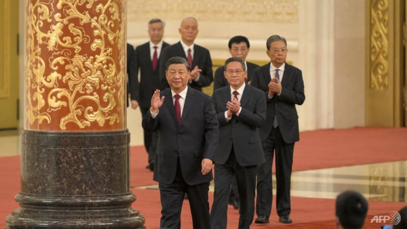 China's Xi secures historic third term in office, unveils new top party officials