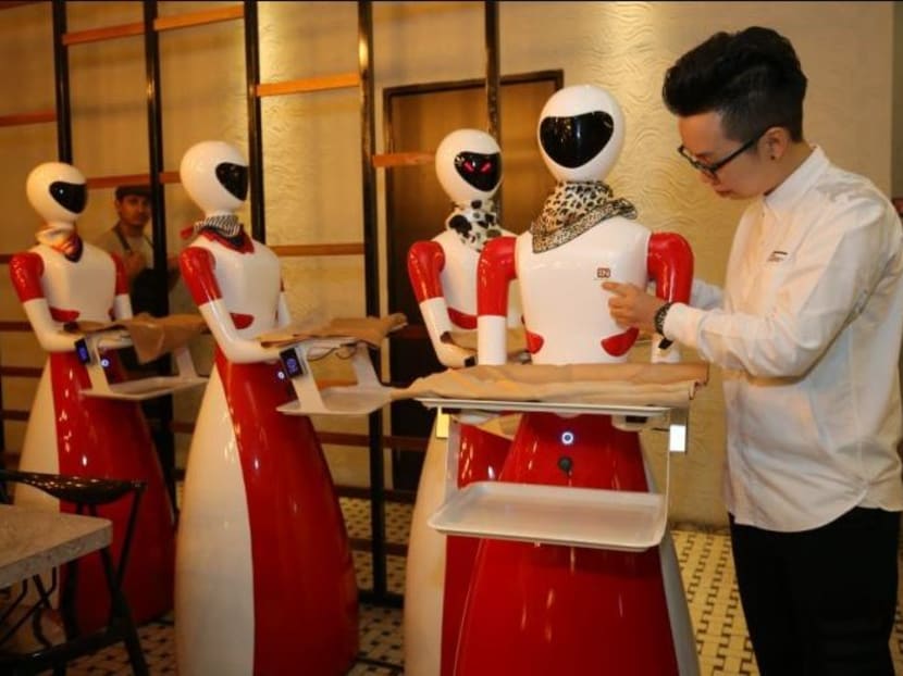 The robots have been programmed to speak English and Cantonese although they are actually capable of conversing in 36 languages. Photo: THE MALAY MAIL ONLINE