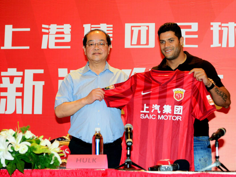 Chinese Super League teams have spent more than S$577 million on players this year, including Shanghai SIPG’s signing of Brazil’s Hulk (right). Photo: AFP