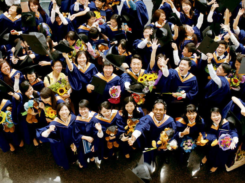 Students graduating from the National University of Singapore, where the proportion of foreign students has fallen from 23.3 per cent in 2013 to 17.3 per cent in 2017.  Photo: NUS