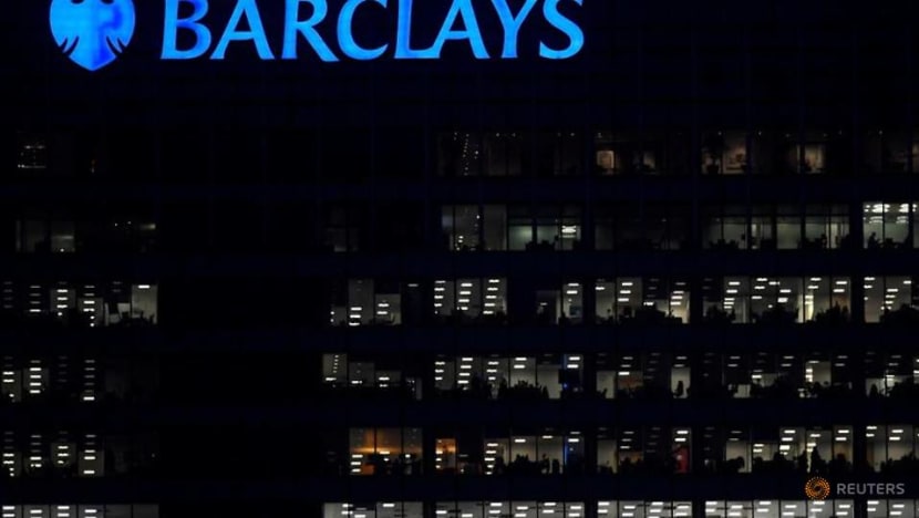 Barclays resumes dividend payouts as annual profit halves Barclays resumes dividend payouts as annual profit halves
