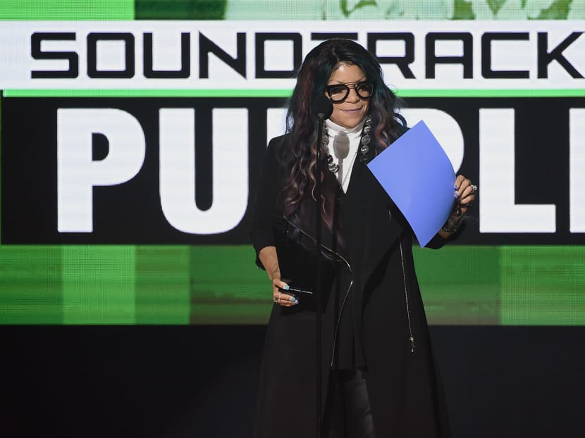 File photo of Tyka Nelson accepting Top Soundtrack for Purple Rain on behalf of her brother, the late musician Prince, onstage during the 2016 American Music Awards at Microsoft Theatre. Photo: AFP