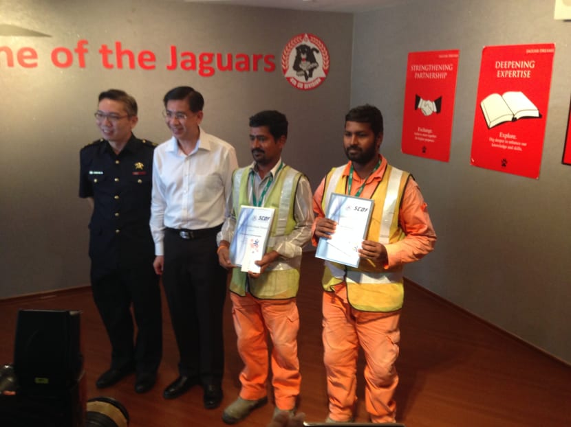 From left to right: Lt Col Michael Chua, MP for Jurong GRC Mr Ang Wei Neng, Mr S Shanmugamnathan and Mr P Muthukumar