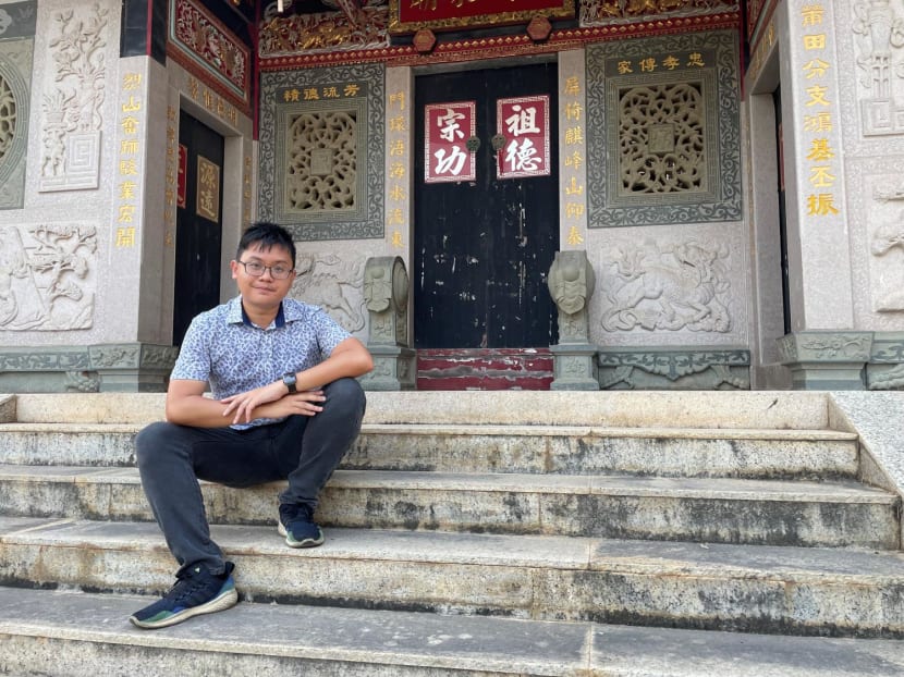 The author, Charles Phang, poses for a photo on the steps of his ancestral home in the Taiwanese county of Kinmen.