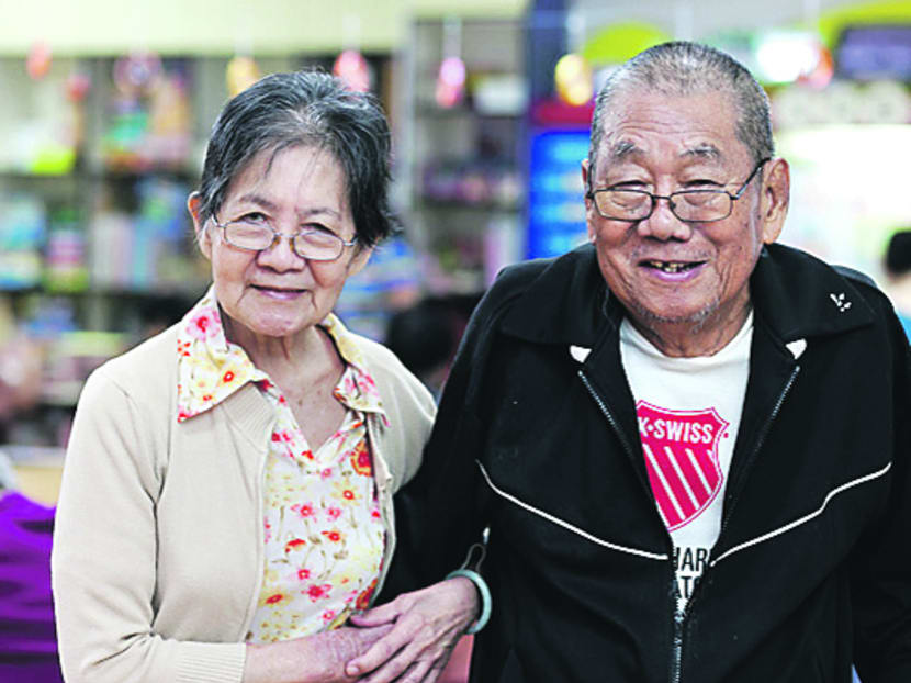 HomeCare Assist has allowed Mr Tan (right) to stay at home with his wife Ng Soon Ai, who suffers from dementia, after he was hospitalised from a fall in 2010. Photo: CGH