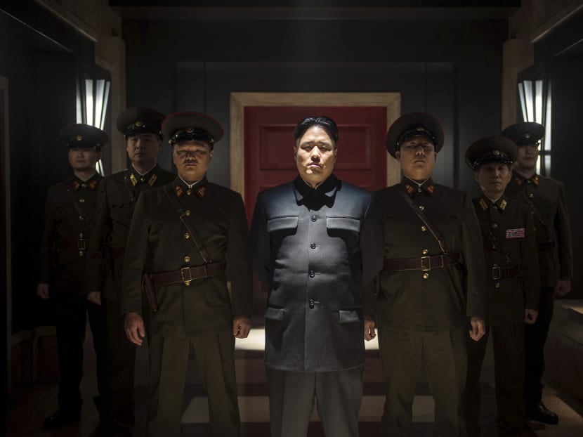 Randall Park, centre, plays Kim Jong-un, the North Korean leader, in “The Interview,” whose release Sony cancelled this week. Photo: Columbia Pictures/Sony