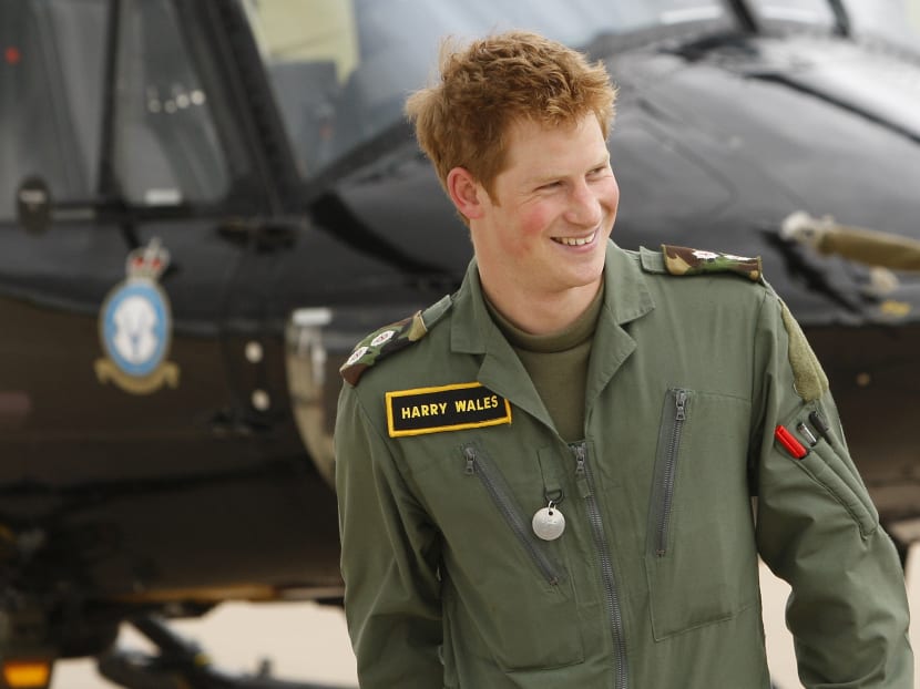 Britain's Prince Harry smiles during a photo call at RAF (Royal Air Force) Shawbury in Shropshire, England in 2009. AP file photo