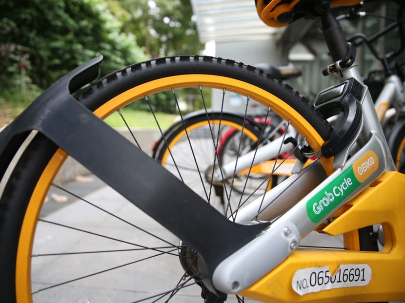 Grab announced the launch of its new bike-sharing app, which brings oBike, GBikes, Anywheel, Popscoot under one platform. Photo: Koh Mui Fong/TODAY