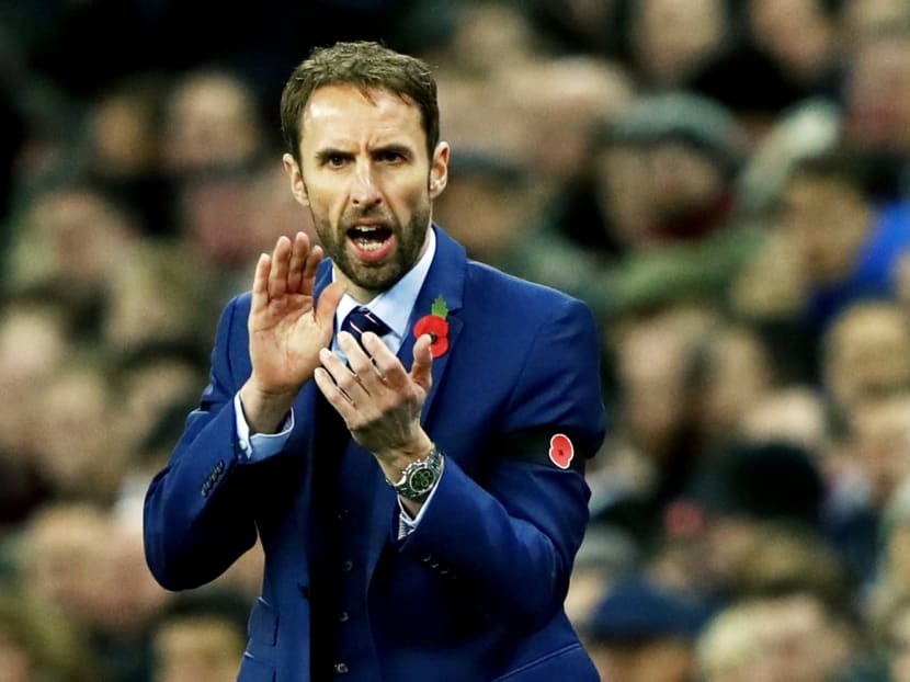 England interim manager Gareth Southgate celebrating the 3-0 win over Scotland on Friday. Photo: Reuters