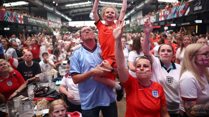 Red and white England fans gather in London for Women's Euro final