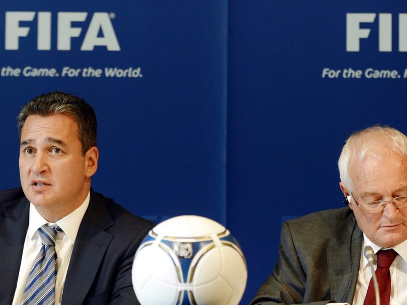 FIFA ethics judge Hans-Joachim Eckert (right) has confirmed that his investigative counterpart Michael Garcia did not receive a copy of the 42-page statement before it was made public. PHOTO: AP