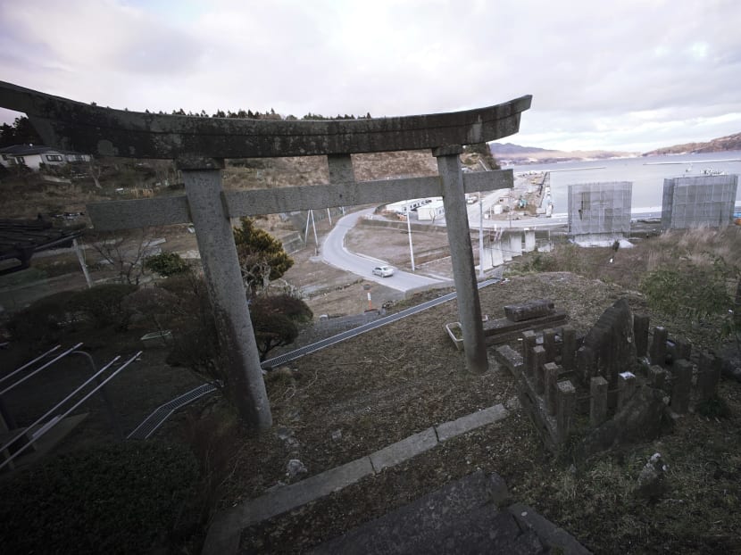 Japan opts for massive, costly sea wall to fend off tsunamis