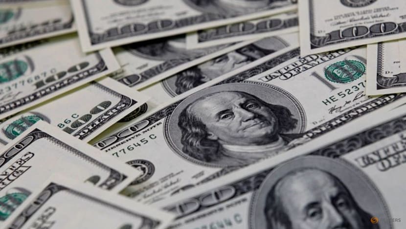 Dollar holds near two-week lows in Fed's wake Dollar holds near two-week lows in Fed's wake