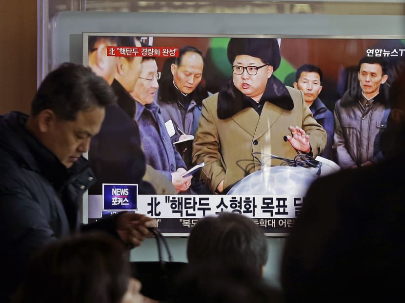People watching a televised news programme featuring North Korean leader Kim Jong-un, at Seoul Railway Station in South Korea. Mr Kim’s determination to develop nuclear weapons in defiance of UN resolutions has raised tensions in the region. Photo: AP