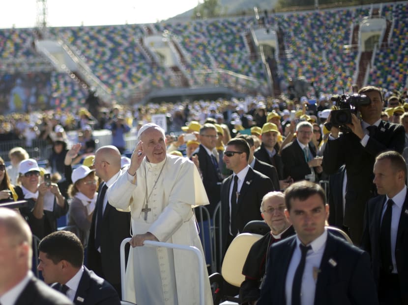 Pope Francis arrives to celebrate a Mass at the Meskhi stadium in Tbilisi, Georgia, on Saturday, Oct. 1, 2016. The pontiff is traveling to Georgia and Azerbaijan for a three-day visit. Photo: AP