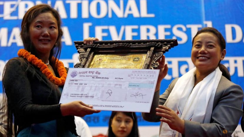 Nepali woman's 10th Everest climb breaks her own record Nepali woman's 10th Everest climb breaks her own record