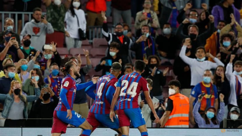 Football: Barca scrape late draw with Granada as fans stay away Football: Barca scrape late draw with Granada as fans stay away