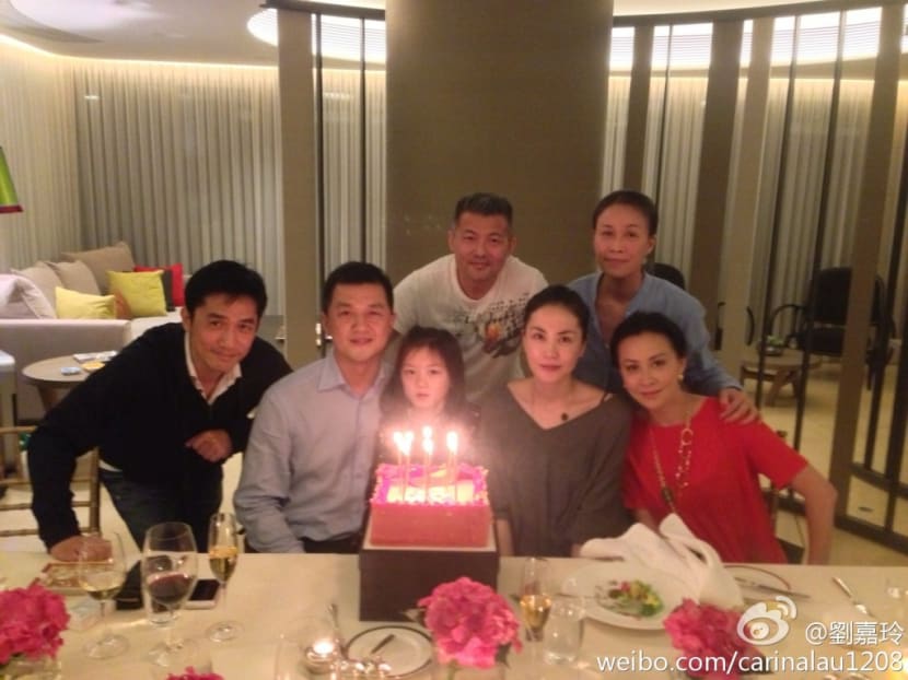 IN HAPPIER TIMES: (L-R, anti-clockwise) Tony Leung, Li Yapeng, Li Yan, Faye Wong, Carina Lau, Na Ying and (Na Ying's husband) Meng Tong at 7-year-old Li Yan's birthday party in May this year. (Photo: Carina Lau's Weibo)