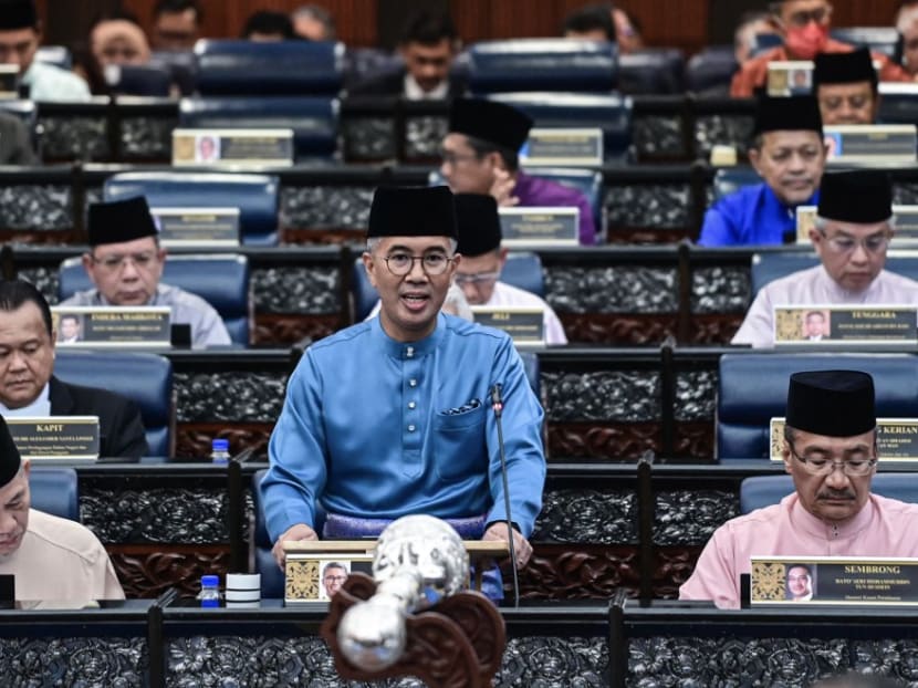 Malaysia's Finance Minister Tengku Zafrul Tengku Abdul Aziz (centre) delivering a speech as he unveils the national 2023 budget at the Parliament in Kuala Lumpur.
Malaysia's Finance Minister Tengku Zafrul Tengku Abdul Aziz (centre) delivering a speech as he unveils the national 2023 budget at the Parliament in Kuala Lumpur.